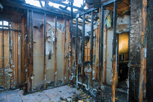 Professional Fire Damage Restoration technician working in Binghamton, NY